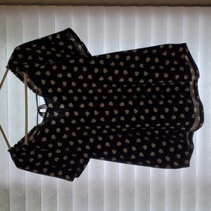 Cute jersey top, black with daisies and butterfly sleeves